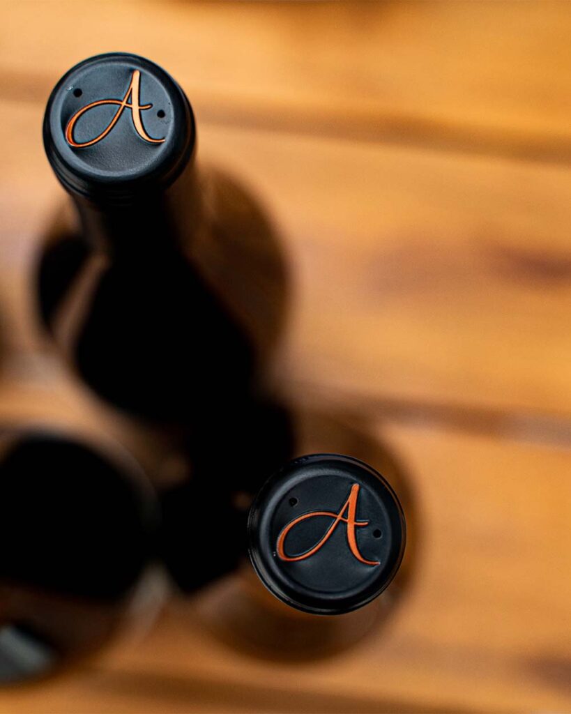 A close up, birds eye view of the cap on Anaba wine bottles, showing their signature A. 